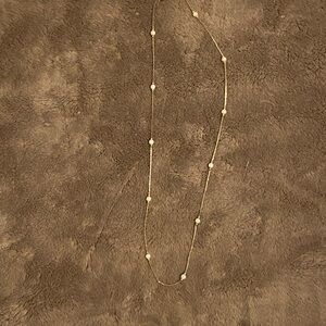 Elegant Gold and Pearl Necklace